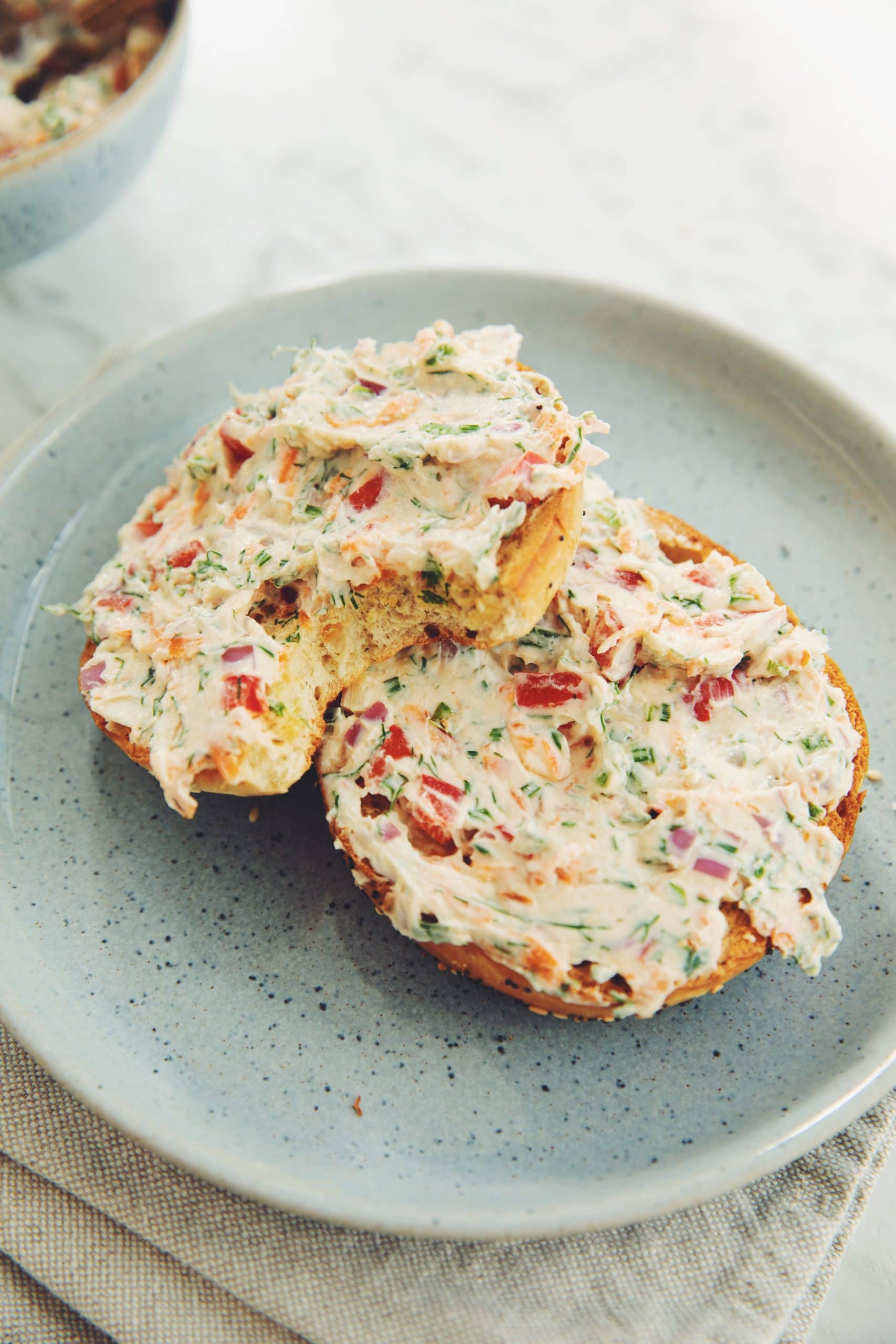 veggie vegan cream cheese smeared on a bagel